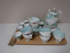 A tray containing a Royal Albert Elfin part tea set,