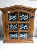 A pine glazed door wall cabinet - Pears Soap CONDITION REPORT: This measures 59cm