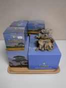 A tray of ten boxed Tusker elephant ornaments