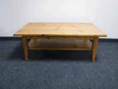 A pine two tier coffee table