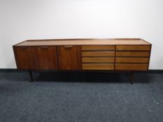 A mid twentieth century teak Long John sideboard,