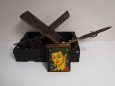 A carved Eastern hardwood folding stand,