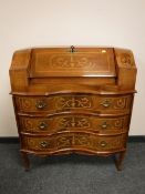 A nineteenth century style inlaid walnut bureau,