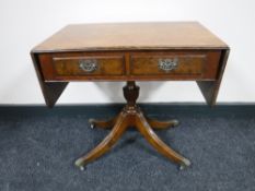 A walnut drop end pedestal sofa table,