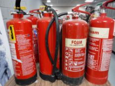 Eleven fire extinguishers