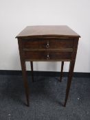 A Victorian inlaid mahogany side table fitted two drawers