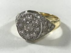 A superb quality 18ct gold diamond set signet ring, the centre stone weighing approximately 0.