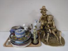 A large gilt figure together with a tray of assorted wall plates, Royal Doulton plate,