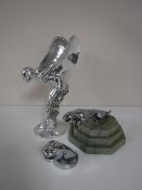 A Jaguar car mascot mounted on a marble plinth together with a Jaguar head bottle opener and a