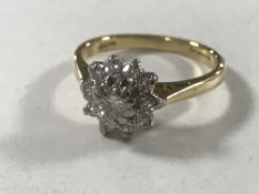 An 18ct gold diamond cluster ring, 3.