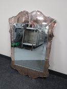 A frameless Art Deco two-tone mirror CONDITION REPORT: 91cm by 61cm.