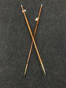 A pair of ceremonial tapered military swagger canes, with E.P.N.S. and brass mounts, length 130 cm.