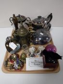 A tray containing a part silver plated tea set, brassware, thimbles, costume jewellery,