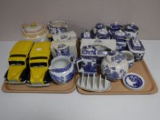 Two trays of Ringtons china : willow pattern teapots, caddies, butter dish, toast rack,