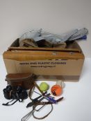 A box containing cased binoculars, box of hand tools,