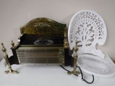 A brass electric fire with glass coals together with a dismantled cast metal garden chair