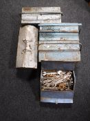 Six metal tool boxes containing assorted hand tools including spanners, wheel braces,
