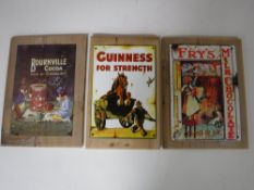 Three metal advertisements mounted on pine boards - Fry's,
