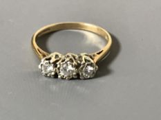 A 9ct gold three stone diamond ring, approximately 0.25ct.
