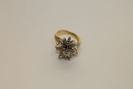 An 18ct gold diamond set ring, the principal stone weighing an estimated 0.3 carat, 7.