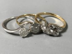 Two 18ct white gold diamond set rings, 4.4g, together with a 9ct diamond cluster ring.
