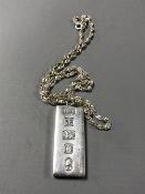 A silver ingot on sterling silver chain