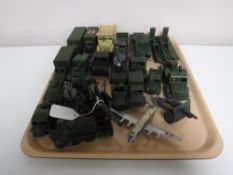A tray containing a quantity of mid twentieth die cast military vehicles, mainly Dinky,