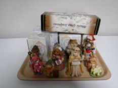 A tray containing six boxed Calico Kittens collectable ornaments,