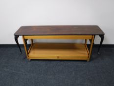 A rectangular mahogany coffee table together with a two tier dumb waiter