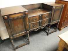 An early twentieth century oak sideboard,