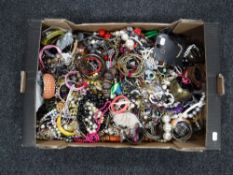 A box containing a large quantity of costume jewellery