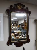 A mahogany framed Chippendale style wall mirror