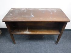 A mid 20th century mahogany book table