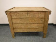 A rustic pine farmhouse hay bin,