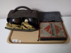 Two vintage wooden lawn bowls in bag,