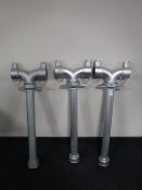 Three reproduction fire hydrant stands