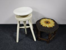 A circular painted adjustable stool together with a hexagonal oak tapestry upholstered stool