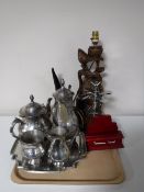 A tray containing a carved hardwood table lamp of a koi together with a horn desk stand,