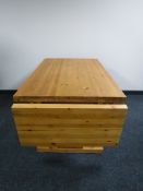 A pine refectory flap-end dining table