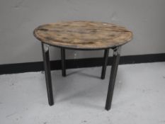 An oak whiskey barrel lid coffee table