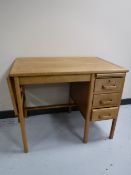 A mid 20th century oak flap end desk CONDITION REPORT: This measures 71cm high,