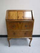 A mid 20th century walnut bureau