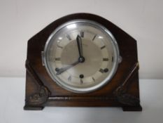 An oak cased Westminster chime mantel clock with keys