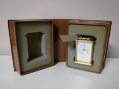 A boxed Norman Mathew carriage clock with key