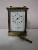 A brass cased Wellington carriage clock with key