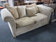 A Victorian style settee on bun feet