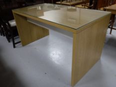 An Ikea glass topped desk