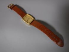 A vintage Jaeger Gentleman's gold plated wrist watch on brown leather strap CONDITION