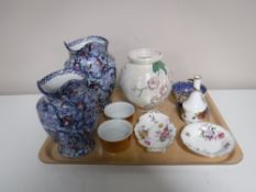 A tray containing two graduated Ringtons Maling ware Chintz jugs,