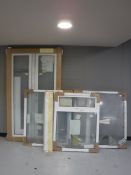 Three UPVC double glazed windows, with sills,